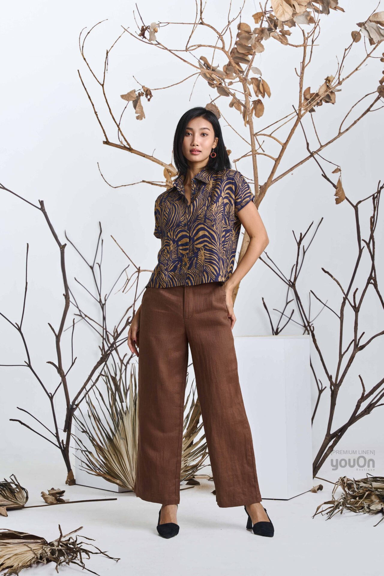 Welfare vân nâu nền xanh - Tricky nâu(1) (1)